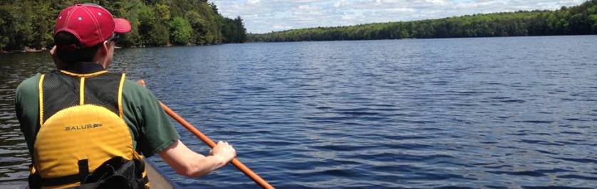 Photo of Person in Canoe