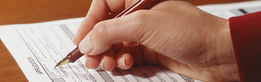 Photo of an Application being signed