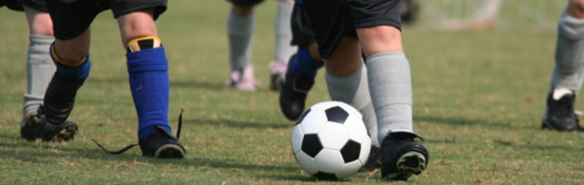 Photo of kids playing soccer